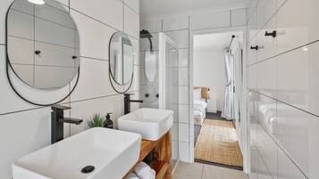 Bathtub, hair dryer, towels