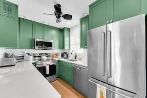 Coffee/tea maker, fridge, microwave, oven