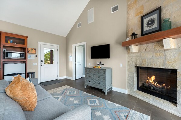 Cottage, 1 King Bed, Patio, Mountain View | Living area | TV, fireplace - Luxury Cottage With Stunning Views-spa Bath-patio (Fredericksburg)
