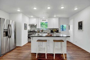 House, Multiple Beds, Patio (413 W Travis St) | Private kitchen | Coffee/tea maker