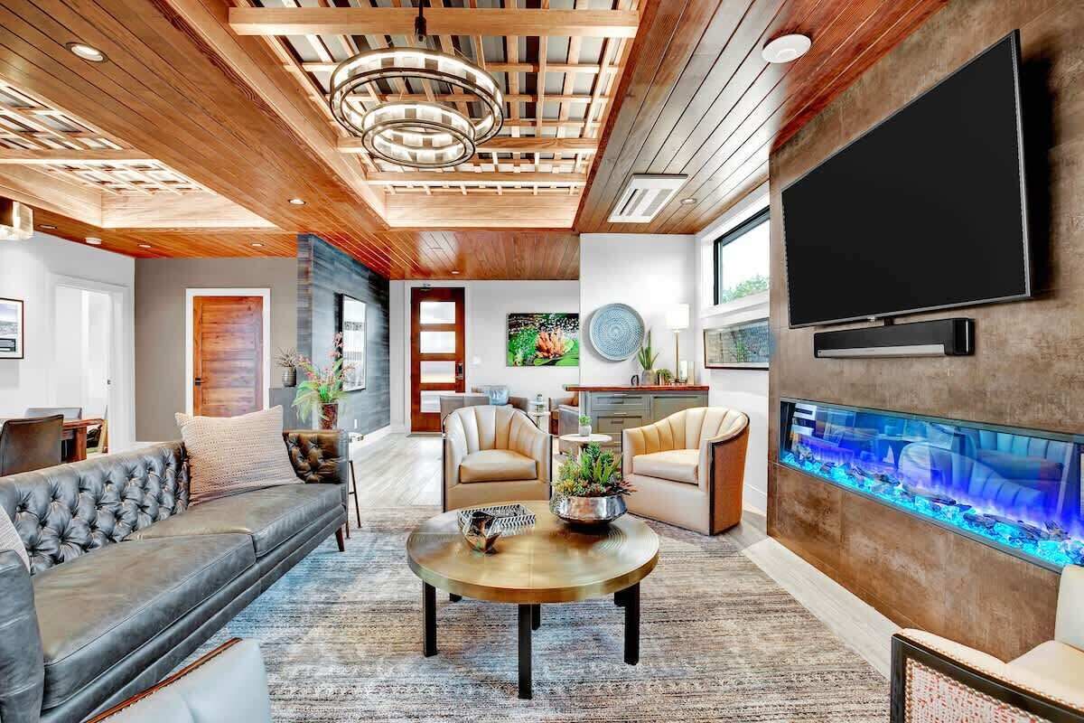 House, Multiple Beds, Pool Access, Pool View (Lariat Springs) | Living area | Fireplace