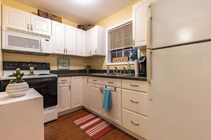 Cabin, Multiple Beds, Patio (103 Red Bird) | Private kitchen | Fridge, microwave, oven, stovetop