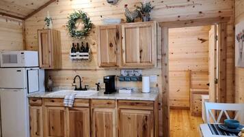 Cabin, 1 King Bed, Kitchen | Private kitchen | Coffee/tea maker