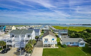 A coastal residential area with houses, a marina, and a large body of water. - Barefoot Beach: Spectacular Family Beach Retreat! (Atlantic Beach)