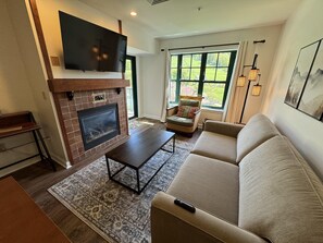 Smart TV, fireplace, foosball