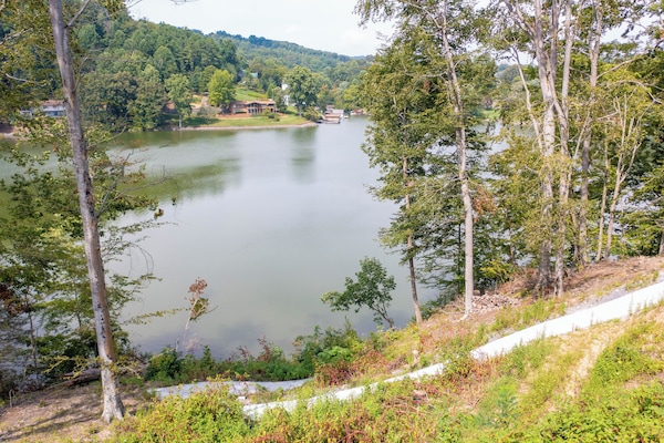 Stunning lake view from the screened-in porch.