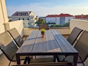 Outdoor dining - Two-bedroom family rooms Villa Poseidon 2 with swimming pool and private balcony (Novalja)