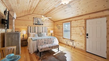 Cabin, 1 King Bed, Kitchen | 1 bedroom, individually decorated, individually furnished, bed sheets