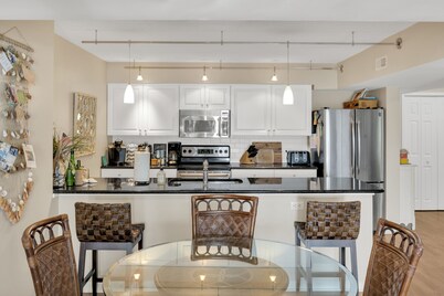 Town of Dewey Beach condo with marina views, pool, balcony