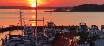 Town of Dewey Beach condo with marina views, pool, balcony