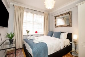 1 chambre, fer et planche Ă repasser, Wi-Fi gratuit, draps fournis