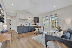 House, Multiple Beds, Hot Tub, City View (215 Mistletoe- D) | Living area - The Grove D With Hot Tub & King Beds - Walk to Main (Fredericksburg)