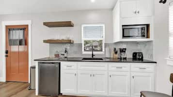 Cottage, 1 King Bed, Patio, City View (215 Mistletoe- B) | Private kitchen | Coffee/tea maker