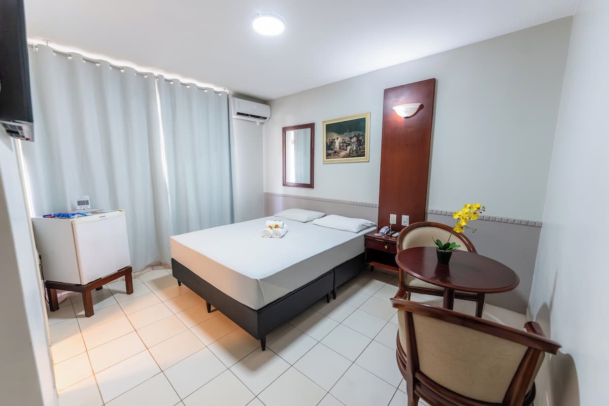 Deluxe Double Room | Minibar, desk, laptop workspace, blackout drapes