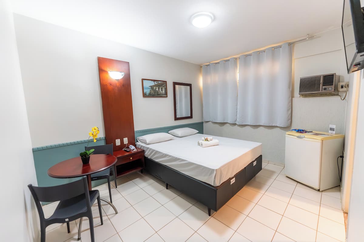 Standard Double Room | Minibar, desk, laptop workspace, blackout drapes