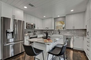 House, Multiple Beds, Pool Access (264 S College St) | Private kitchen - Upscale Home With Pool and Firepit - Close to Mercer St! (Dripping Springs)