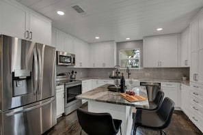 House, Multiple Beds, Pool Access (264 S College St) | Private kitchen - Upscale Home With Pool and Firepit - Close to Mercer St! (Dripping Springs)