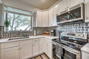 House, Multiple Beds, Pool Access (19007 Helmway Circle) | Private kitchen | Fridge, microwave, oven, stovetop