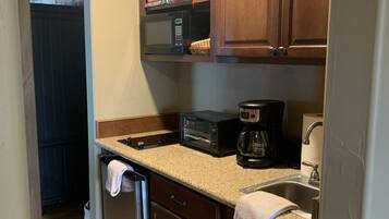 Microwave, coffee/tea maker, toaster, cookware/dishes/utensils