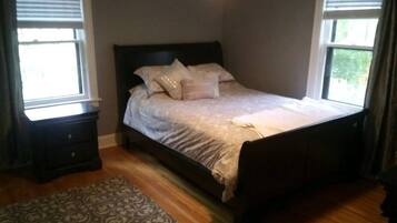 1 bedroom, desk, iron/ironing board, travel crib