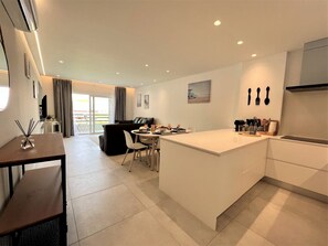 Apartment, 1 Bedroom, Pool Access | Private kitchen | Microwave, oven, dishwasher, coffee/tea maker