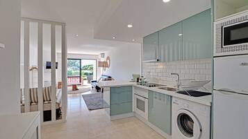 Apartment, 1 Bedroom, Pool Access | Private kitchen | Microwave, oven, coffee/tea maker, electric kettle