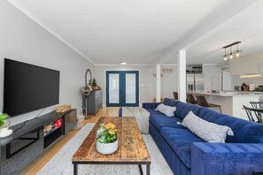 Classic Apartment | Living area | TV - Bodur's Nest Whispering Garden (Tacoma)