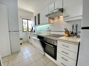 Apartment, 2 Bedrooms, Pool Access | Private kitchen | Microwave, oven, dishwasher, coffee/tea maker - Vilamoura Twins 1 With Pool by Homing (Loulé)