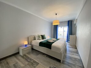 Apartamento, 2 quartos, terraço | 2 quartos, roupa de cama