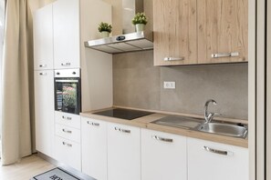 Fridge, oven, dining tables