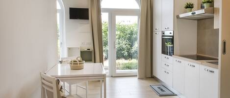 Fridge, oven, dining tables