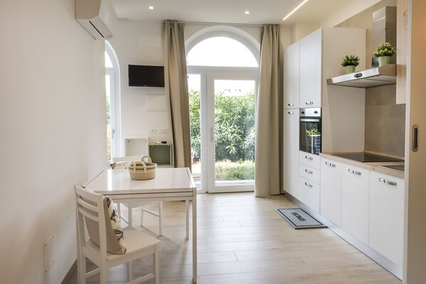 Fridge, oven, dining tables