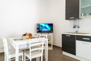 Dining - Cozy and modern 65 sqm apartment, able to accommodate 3 people, located on the second floor of a historic building without a lift. The accommodation is located in the heart of Ortigia (Restricted Traffic Area), the wonderful historic center of Syracuse,  (Siracusa)
