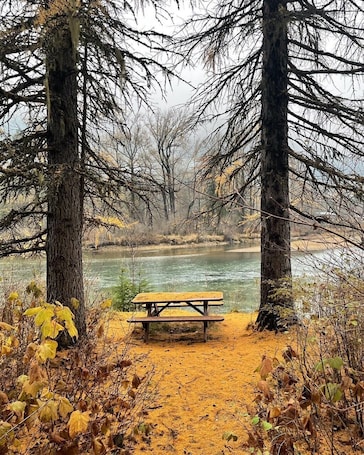 Outdoor dining. Beautiful heritage home suite on main floor in Nelson's best location. Upscale.