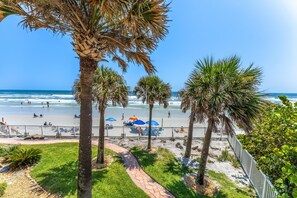 On the beach, sun loungers, beach towels