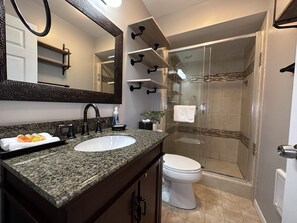 Shower, hair dryer, towels, soap