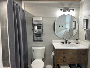 Shower, eco-friendly toiletries, hair dryer, towels
