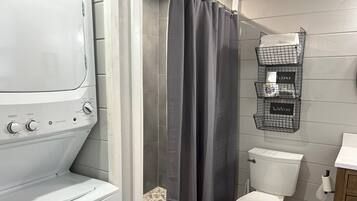 Shower, eco-friendly toiletries, hair dryer, towels