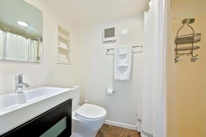 Shower, hair dryer, shampoo