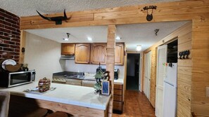 Coffee/tea maker, fridge, microwave, oven - The Old West Rustic Cabin at River Ranch Resort! 103 (River Ranch)