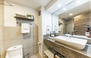 Shower, hair dryer, towels, soap