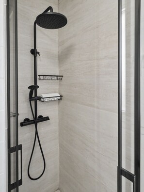 Shower, towels, toilet paper