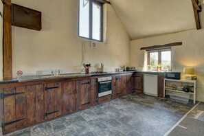 Microwave, oven, dining tables