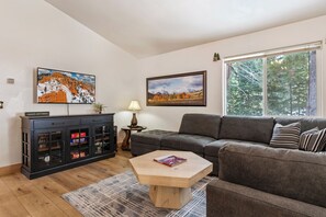 TV, fireplace - Pet-Friendly Cabin Retreat: Cozy 2BR Bear Cabin Getaway in Duck Creek Village (Duck Creek Village)