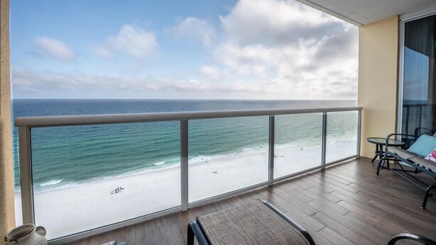 A balcony with a view of the beach and ocean. - Beautiful 5 Star Condo right on the Beach!  Breathtaking Views!! (Navarre Beach)