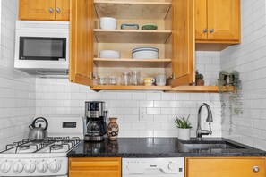 Fridge, microwave, dishwasher, coffee/tea maker