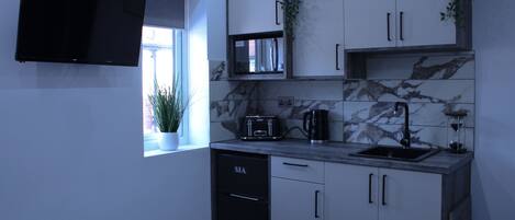 Fridge, microwave, toaster