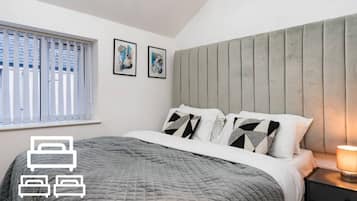 1 slaapkamer, een strijkplank/strijkijzer, wifi, beddengoed