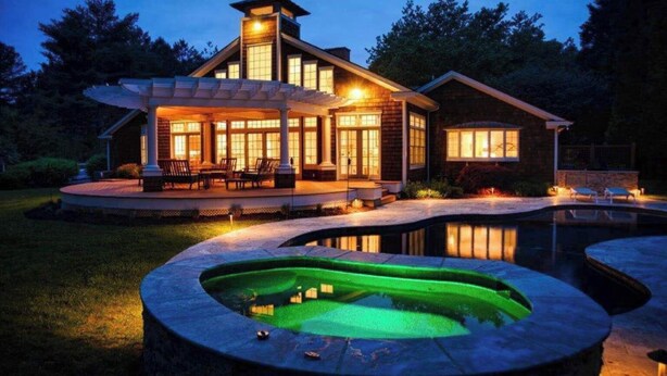 A modern house with a large deck, a swimming pool, and a hot tub. - St. Michaels Escape | Pool, Hot Tub & Fire Pit (Saint Michaels)