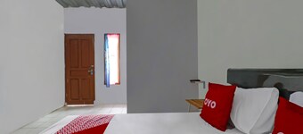 OYO 90809 Homestay Black Pink Merah Jambu Syariah